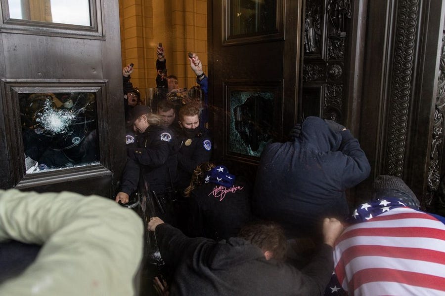 Fact Check: Did an ‘Inside Man’ Open Capitol Doors for Rioters on January 6?