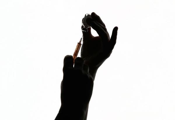 Featured image for post: Fact Check: Is There a Connection Between COVID Vaccines and Hepatitis C?