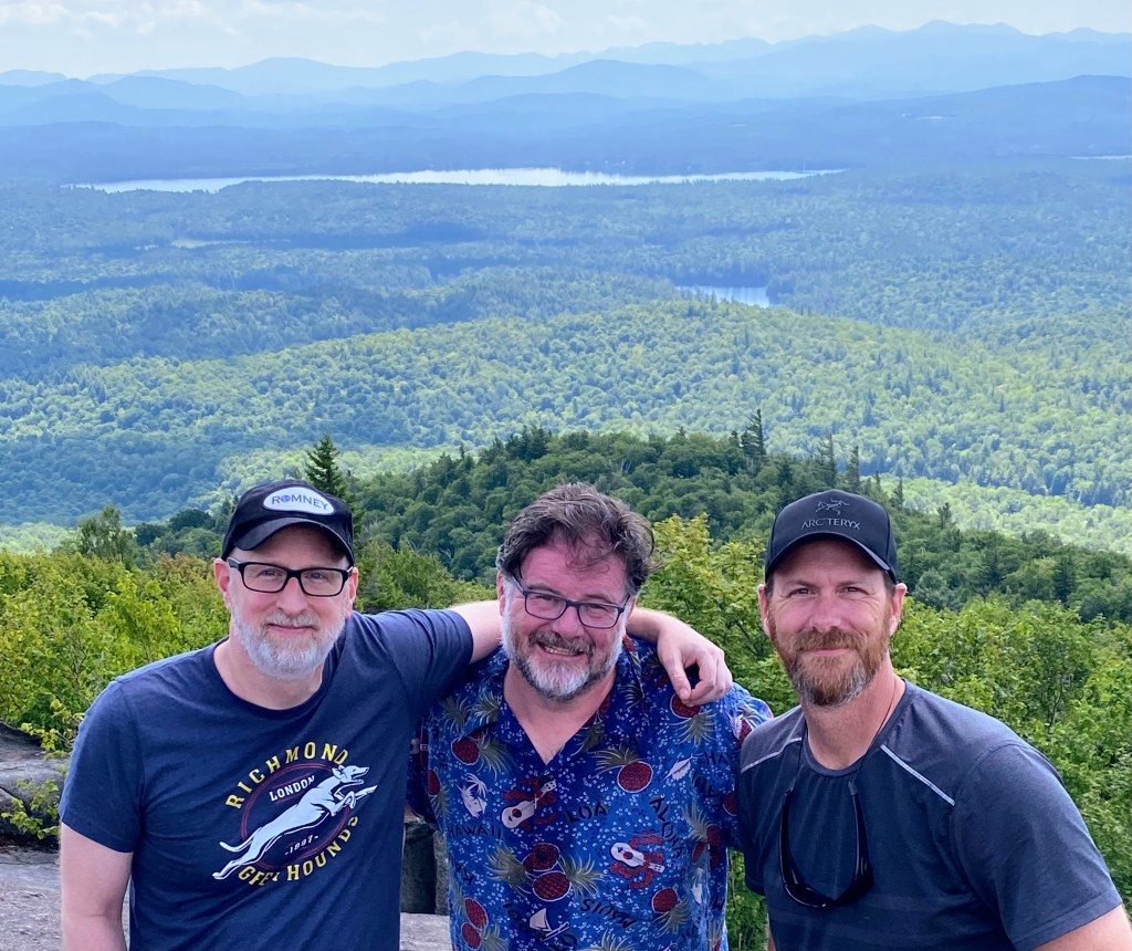 Three old dudes after an “easy” hike up a mountain