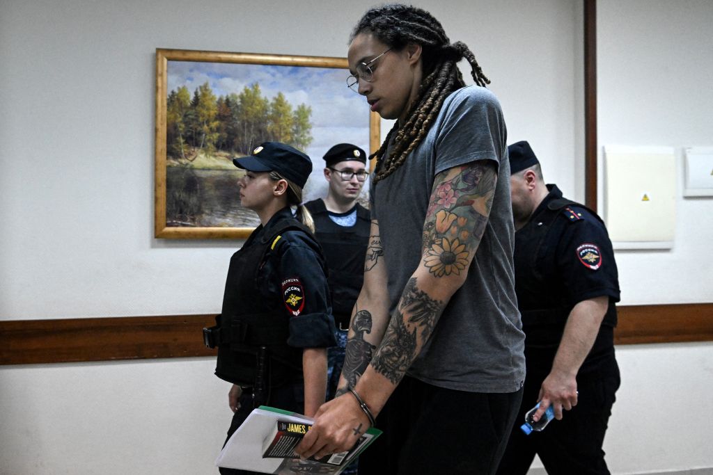 Brittney Griner leaves the courtroom after being found guilty of drug possession charges in a Russian court on August 4, 2022. (Photo by Kirill Kudryavtsev / AFP via Getty Images.)