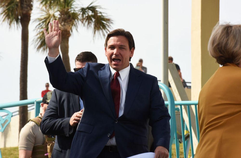 Florida Gov. Ron DeSantis arrives at a press conference to