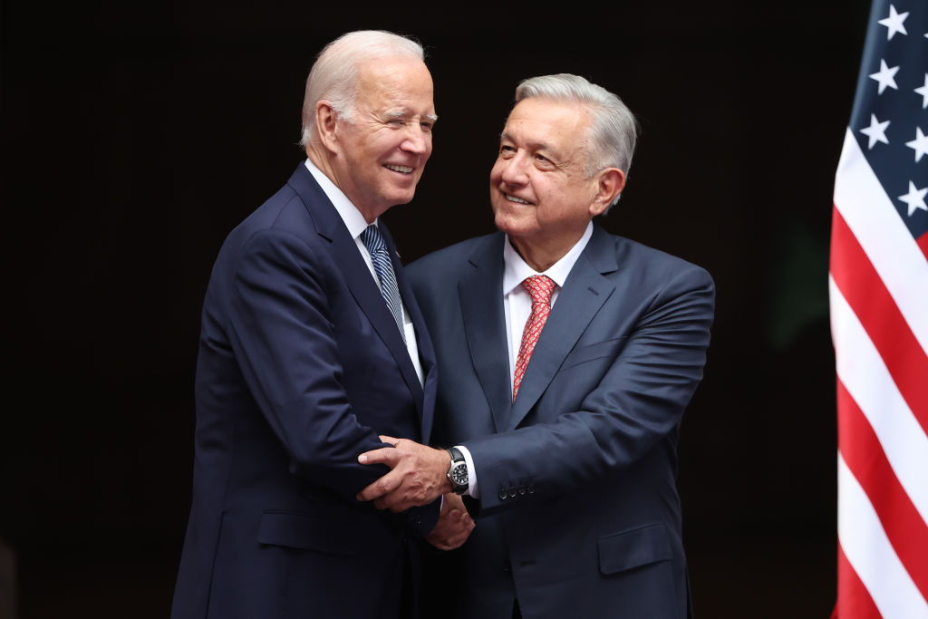 U.S. President Joe Biden greets Mexican President Andres Manuel Lopez Obrador at the 2023 North American Leaders Summit in Mexico City, Mexico. (Photo by Hector Vivas/Getty Images)