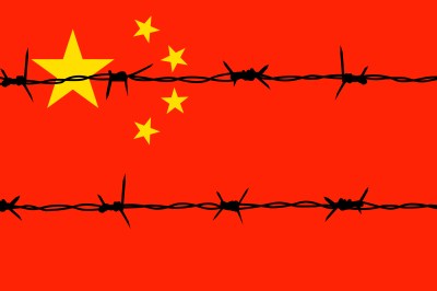 Barbed wire on the background of the chinese flag