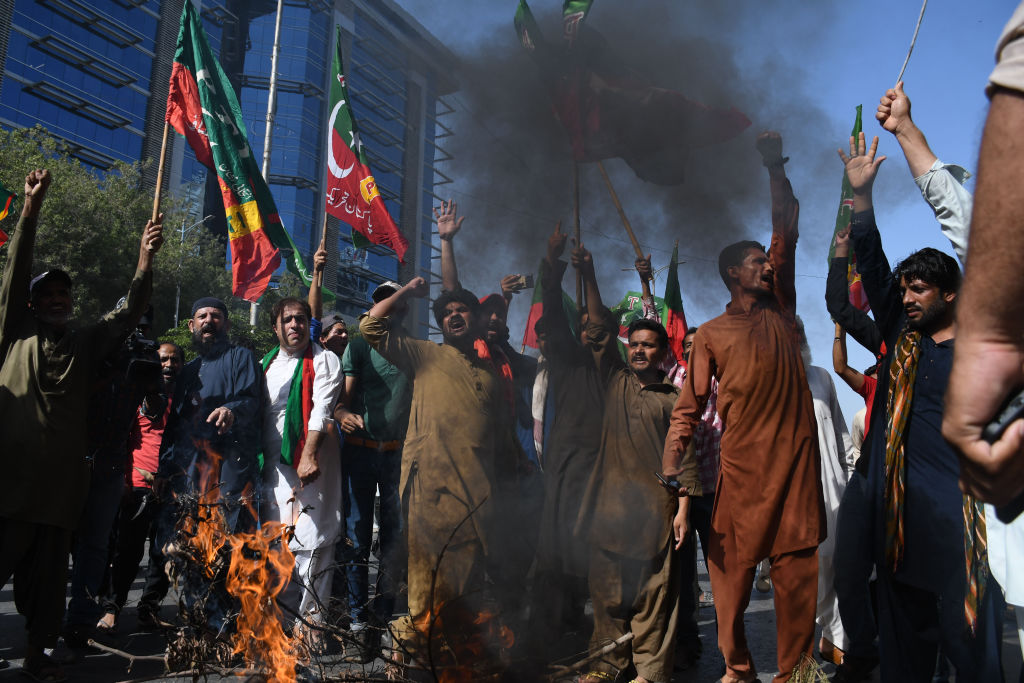 Supporters of Imran Khan take part in a protest against the arrest of the former prime minister in Karachi, Pakistan on May 09, 2023. (Photo by Sabir Mazhar/Anadolu Agency via Getty Images)