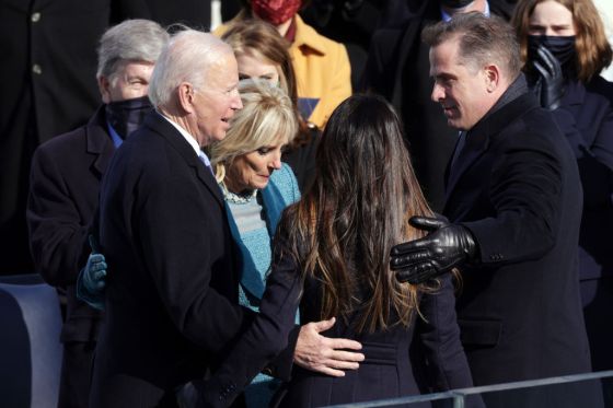 Joe Biden hugs his wife Dr. Jill Biden, son Hunter Biden and daughter Ashley Biden after being sworn in as U.S. president. (Photo by Alex Wong/Getty Images)