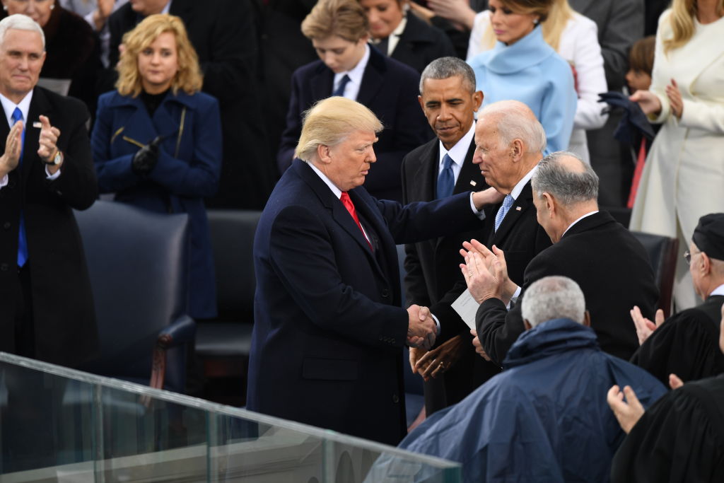Former President Donald Trump shakes hands with President Joe Biden at the former's inauguration on January 20, 2017.
(Photo by Jonathan Newton /The Washington Post via Getty Images)