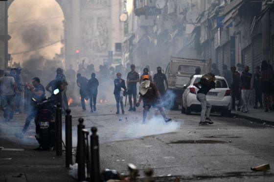 Protesters clash with riot police at the Porte d'Aix in Marseille, southern France. (Photo by CHRISTOPHE SIMON / AFP) (Photo by CHRISTOPHE SIMON/AFP via Getty Images)