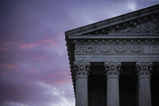 The U.S. Supreme Court building at dawn (Photographer: Samuel Corum/Bloomberg)