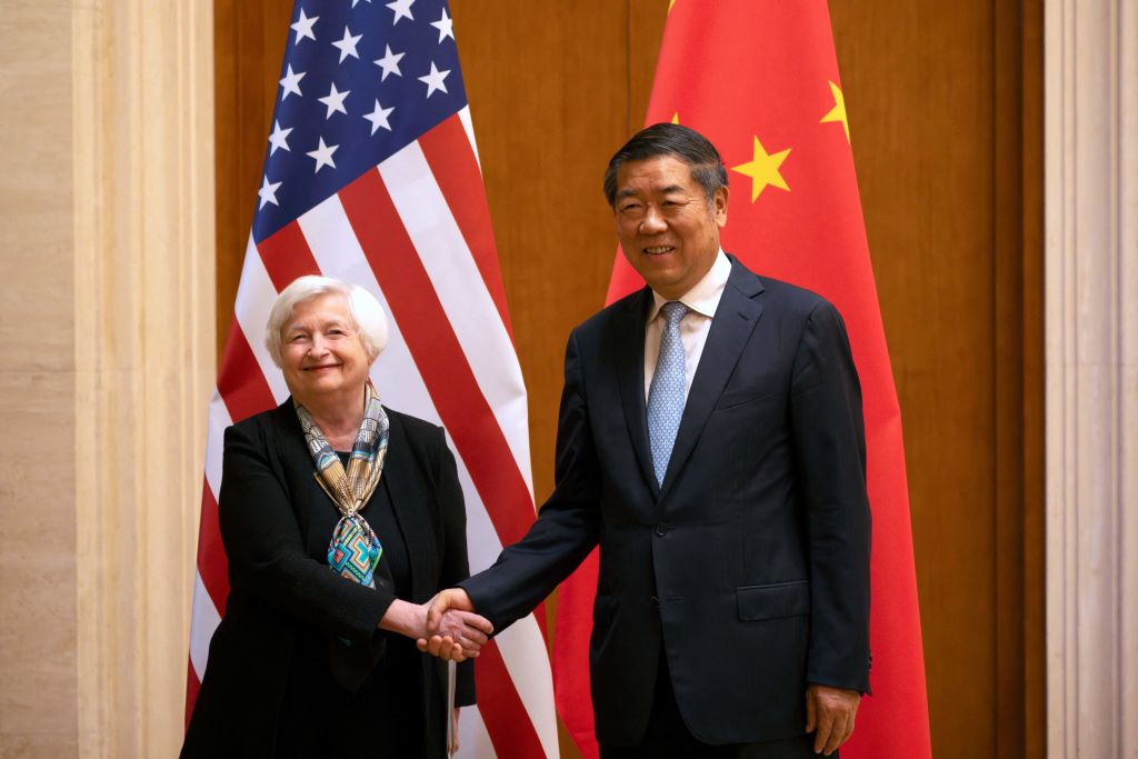 Treasury Secretary Janet Yellen shakes hands with Chinese Vice Premier He Lifeng in Beijing. (Photo by MARK SCHIEFELBEIN/POOL/AFP via Getty Images)