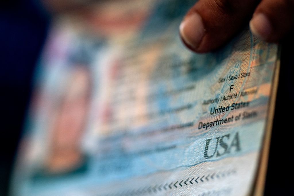 A U.S. passport. (Photo by STEFANI REYNOLDS/AFP via Getty Images)