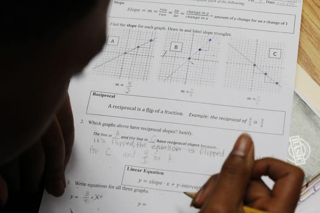 Mission High School junior Jamariae Speed works on a class assignment reviewing linear equations, slopes and reciprocals during Dayna Soares’ Algebra II class at Mission High School on Tuesday, January 8,  2019  in San Francisco, Calif.