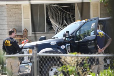 Suspect Shot In FBI Raid Reportedly Connected To President Biden Threats In Utah