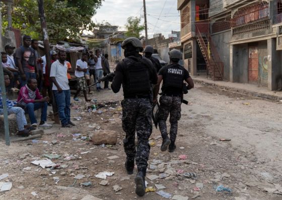 Police search the area during an attack by armed gangs in the Carrefour Feuille neighborhood of Port-au-Prince, Haiti, on November 10, 2022. (Photo by RICHARD PIERRIN/AFP via Getty Images)