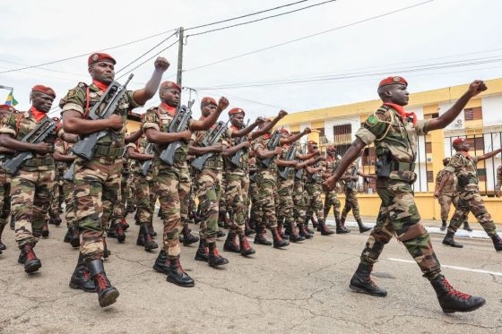 Members of the military take part in a parade in honor of Gen. Brice Clotaire Oligui Nguema (Photo by -/AFP via Getty Images)
