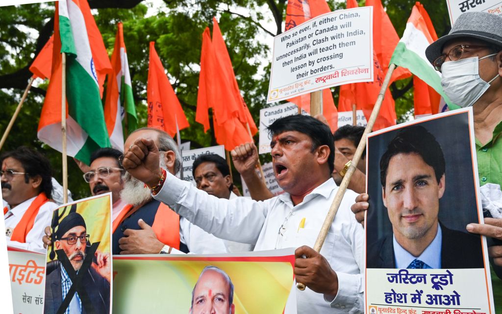 Supporters from United Hindu Front hold placards to protest against the Canadian Prime Minister Justin Trudeau on September 24, 2023 in New Delhi, India. (Photo by Vipin Kumar/Hindustan Times via Getty Images)
