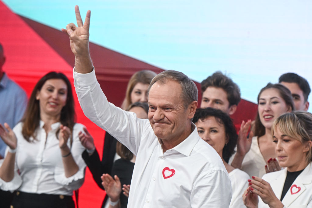 The leader of the Civic Coalition, Donald Tusk, celebrates the exit poll results during Poland's Parliamentary elections on October 15, 2023 in Warsaw, Poland. (Photo by Omar Marques/Getty Images)