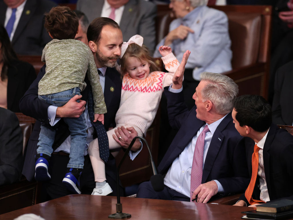 Rep. Kevin McCarthy greets Rep. Lance Gooden and his children in the House Chamber during the fourth day of elections for Speaker of the House at the U.S. Capitol Building on January 7, 2023, in Washington, D.C. (Photo by Win McNamee/Getty Images)