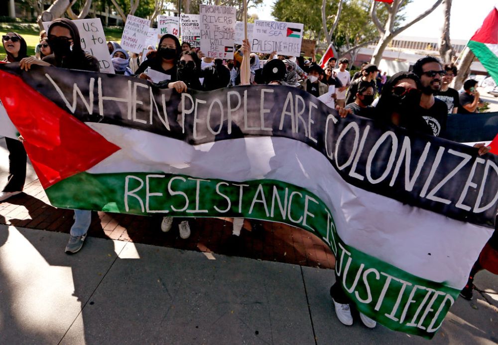 Cal State Long Beach students hold a campus rally in support of Palestinians caught up in the conflict that continued to rage unabated between Arabs and Jews in the Middle East