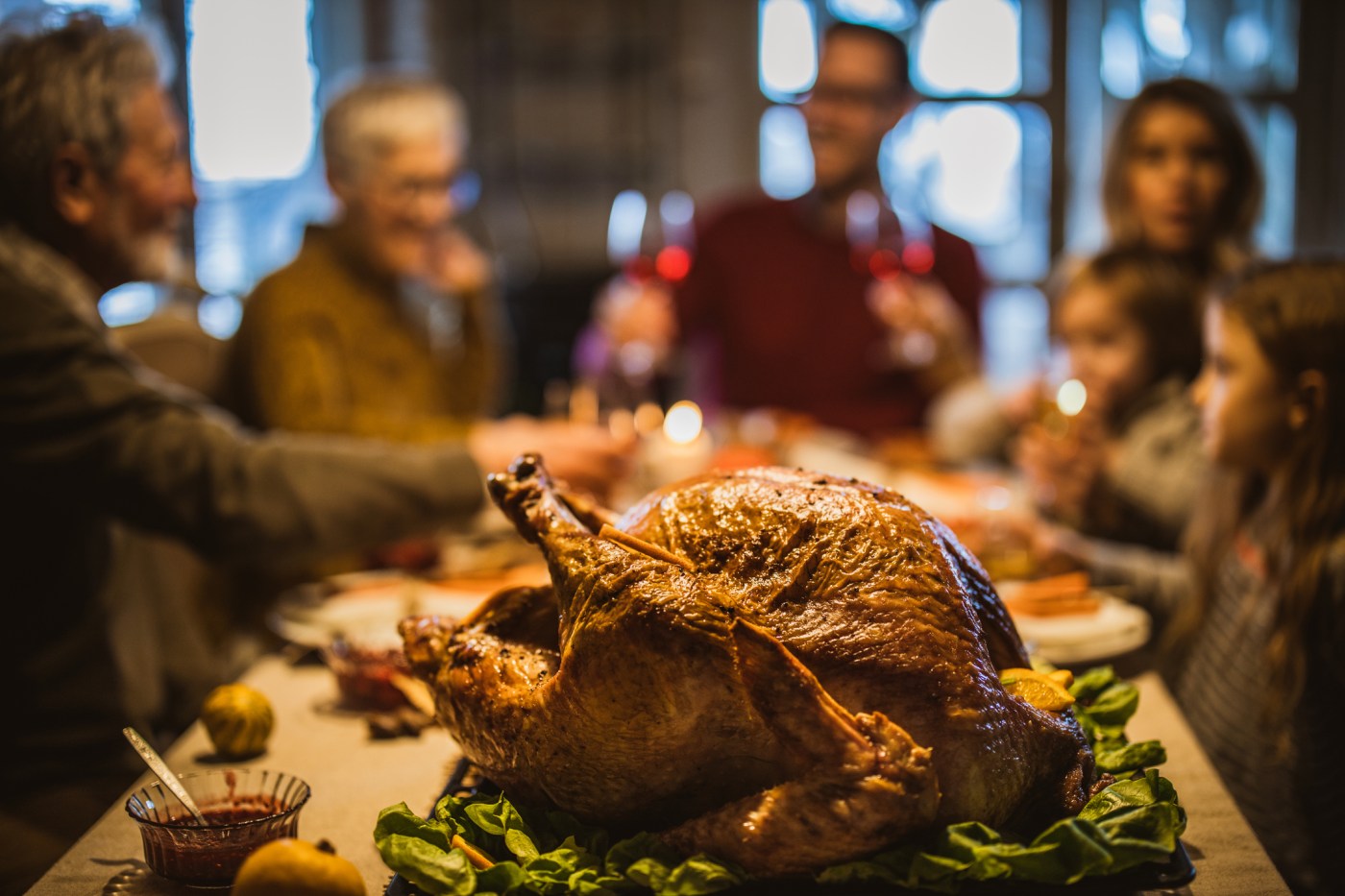 Close up of Thanksgiving turkey on dining table.