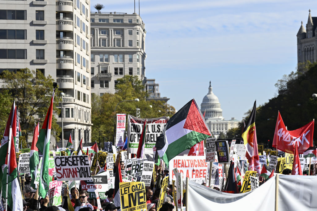 Protesters gather to hold a pro-Palestinian rally at the Freedom Plaza and condemn the Israeli response to Hamas' attack, in Washington, D.C., United States on November 4, 2023. (Photo by Celal Gunes/Anadolu via Getty Images)