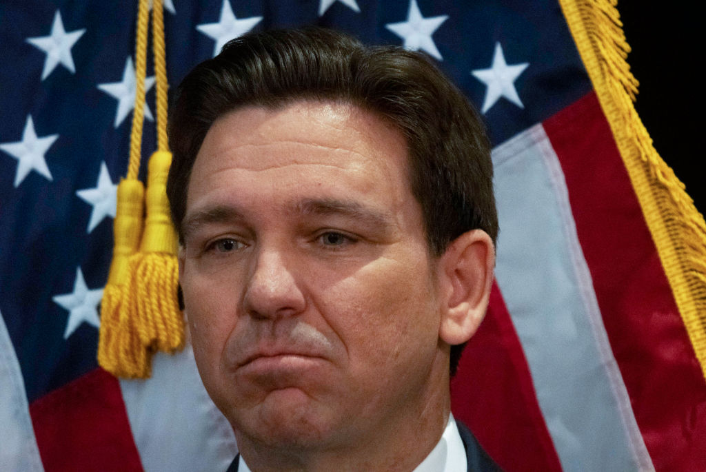 Florida Gov. Ron DeSantis speaks in the spin room following a debate held by Fox News, in Alpharetta, Georgia, on November 30, 2023. (Photo by Christian Monterrosa/AFP/Getty Images)