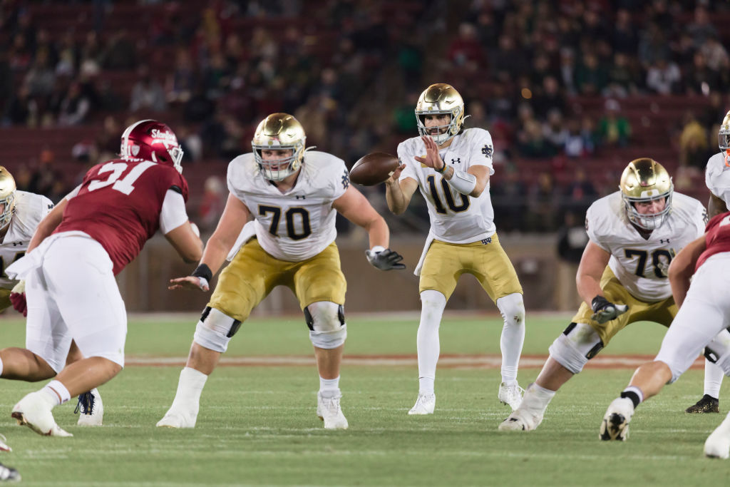 Notre Dame quarterback Sam Hartman takes the snap during a college football game against the Stanford Cardinal on November 25, 2023 at Stanford Stadium in Palo Alto, California. (Photo by David Madison/Getty Images)