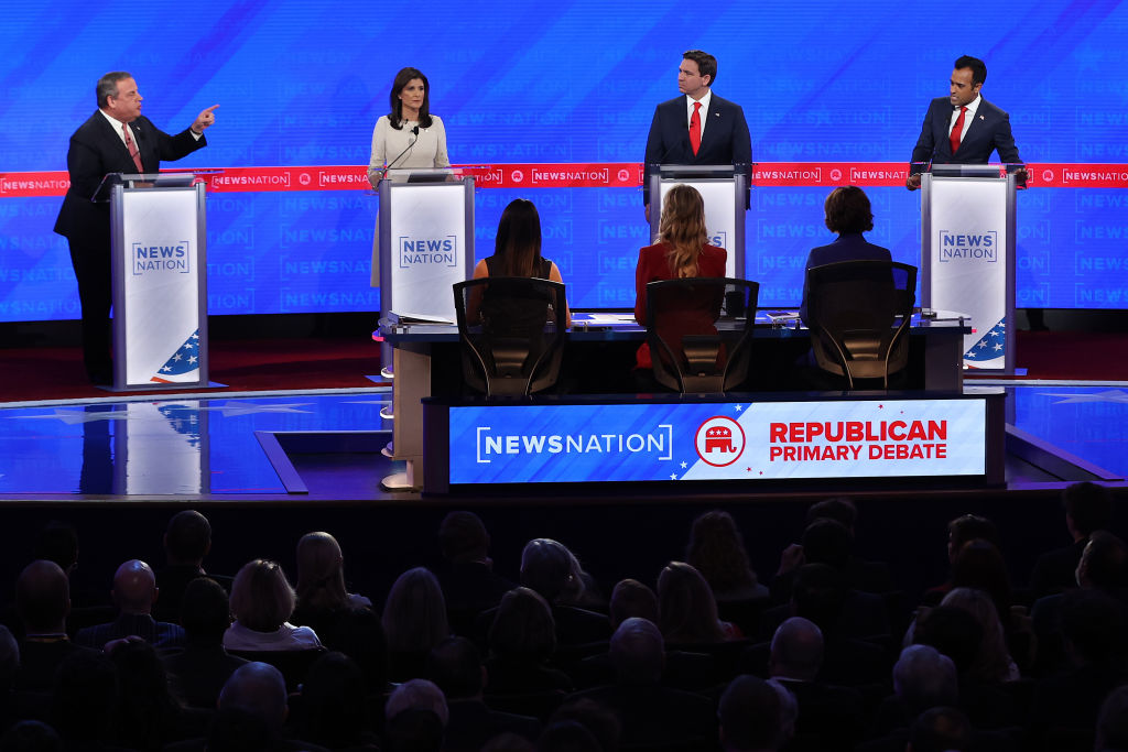Former New Jersey Gov. Chris Christie, former U.N. Ambassador Nikki Haley, Florida Gov. Ron DeSantis, and Vivek Ramaswamy participate in the NewsNation Republican Presidential Primary Debate at the University of Alabama Moody Music Hall on December 6, 2023 in Tuscaloosa, Alabama.  (Photo by Justin Sullivan/Getty Images)