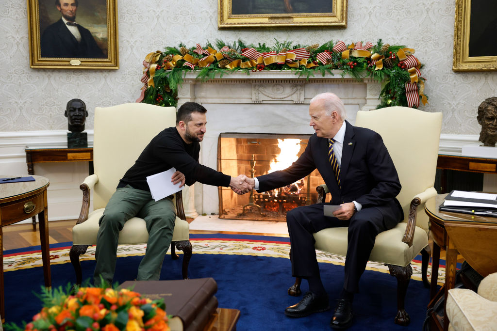 Ukrainian President Volodymyr Zelensky and U.S. President Joe Biden shake hands while meeting in the Oval Office at the White House on December 12, 2023 in Washington, D.C.   (Photo by Chip Somodevilla/Getty Images)