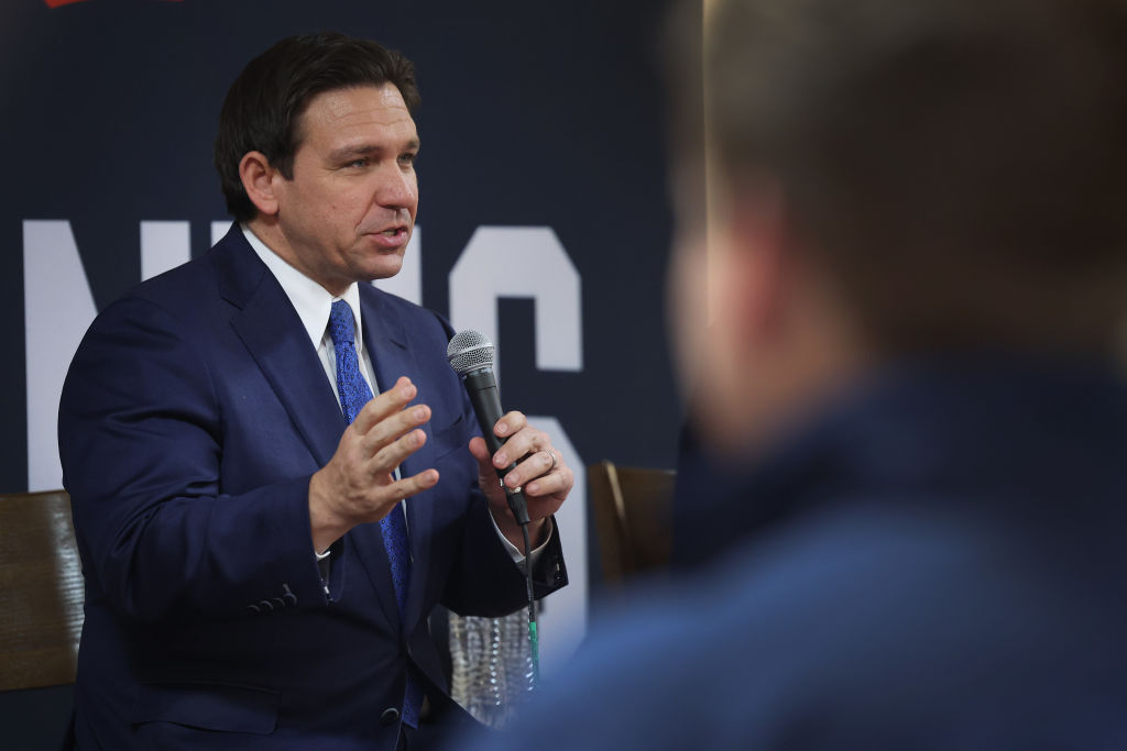 Florida Gov. Ron DeSantis speaks to guests during the Scott County Fireside Chat on December 18, 2023, in Bettendorf, Iowa. (Photo by Scott Olson/Getty Images)