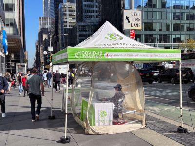 Covid-19 testing tent on sidewalk, Avenue of the Americas, New York City, New York USA