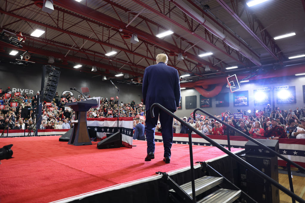 Former President Donald Trump arrives for a rally at Clinton Middle School on January 6, 2024 in Clinton, Iowa. (Photo by Scott Olson/Getty Images)