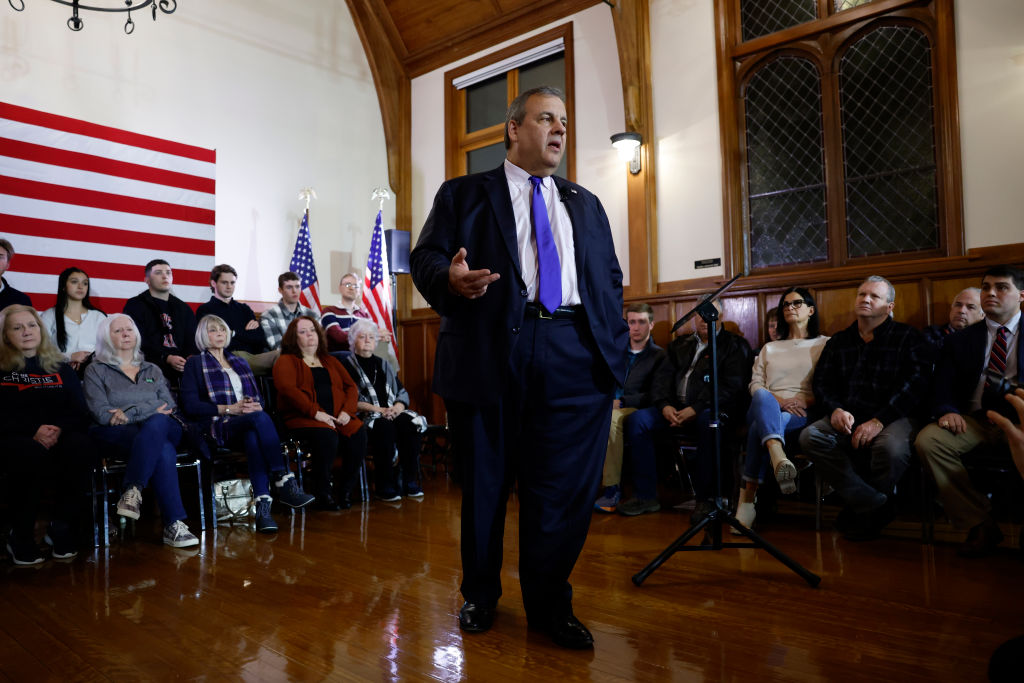 Former New Jersey Gov. Chris Christie announces he is dropping out of the Republican presidential race at Searles School and Chapel in Windham, New Hampshire, on January 10, 2024. (Photo by Danielle Parhizkaran/The Boston Globe via Getty Images)