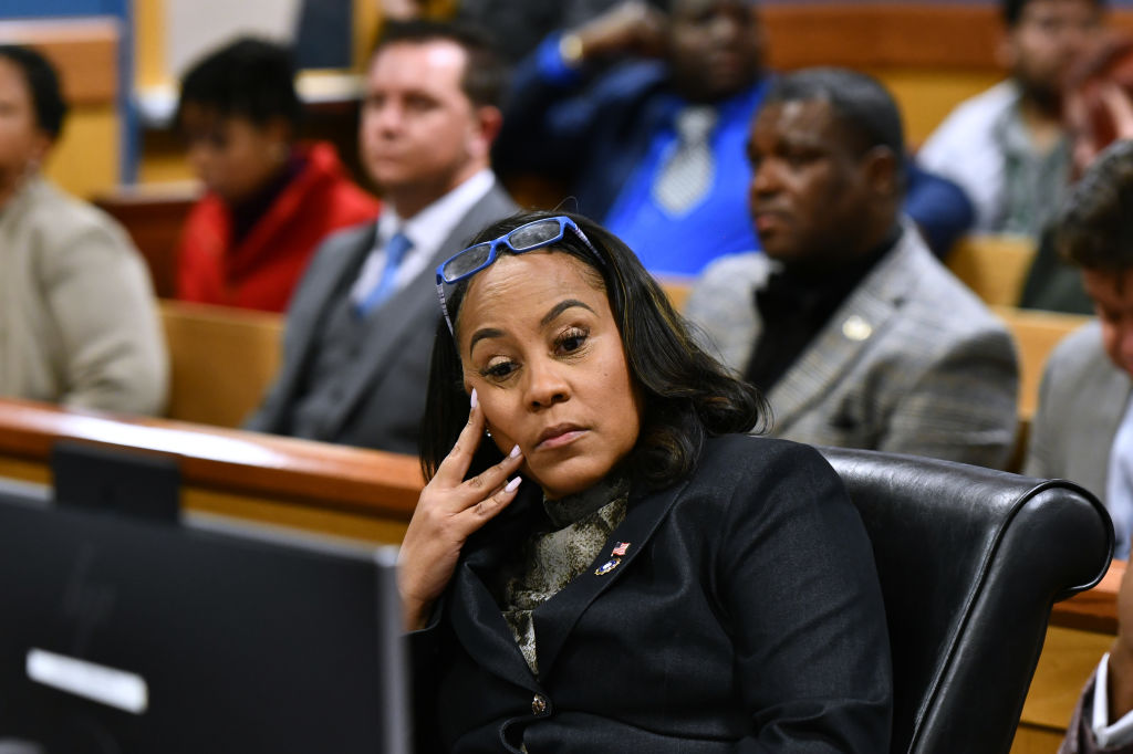 Fulton County District Attorney Fani Willis appears before Judge Scott McAfee for a hearing in the 2020 Georgia election interference case at the Fulton County Courthouse on November 21, 2023, in Atlanta, Georgia. (Photo by Dennis Byron/Getty Images)