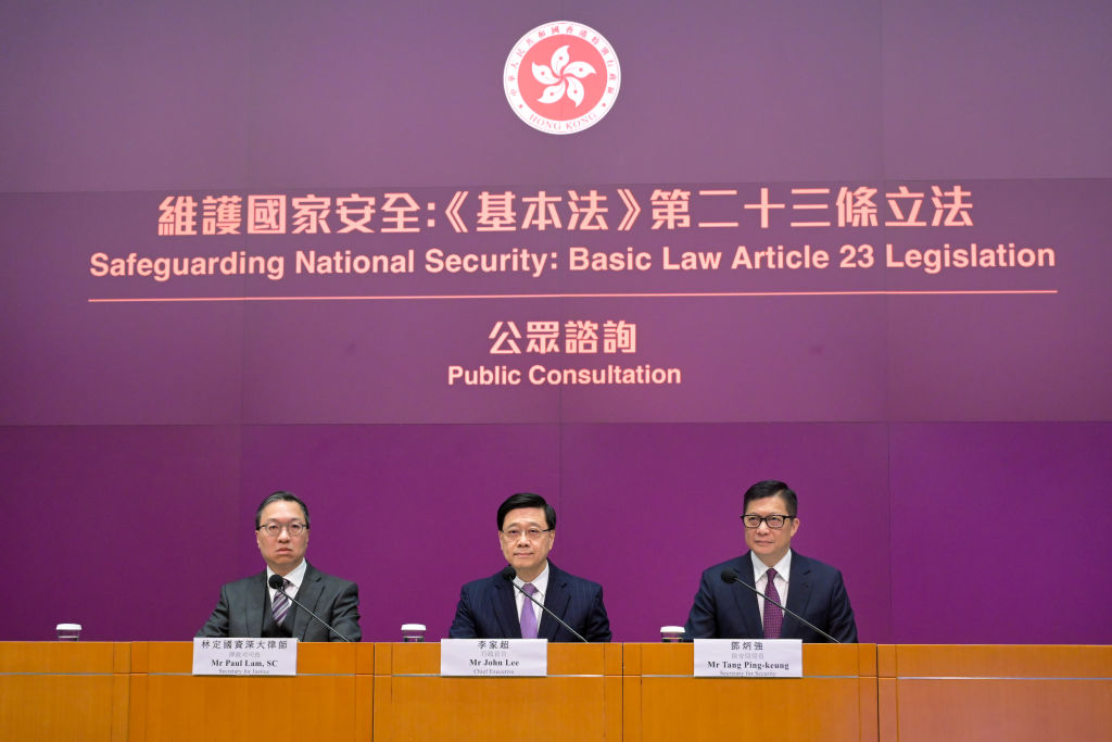 Hong Kong Chief Executive John Lee Ka-chiu and other government officials attend the public consultation proposed to be titled "Safeguarding National Security Ordinance" on January 30, 2024, in Hong Kong, China. (Photo by Chen Yongnuo/China News Service/VCG via Getty Images)