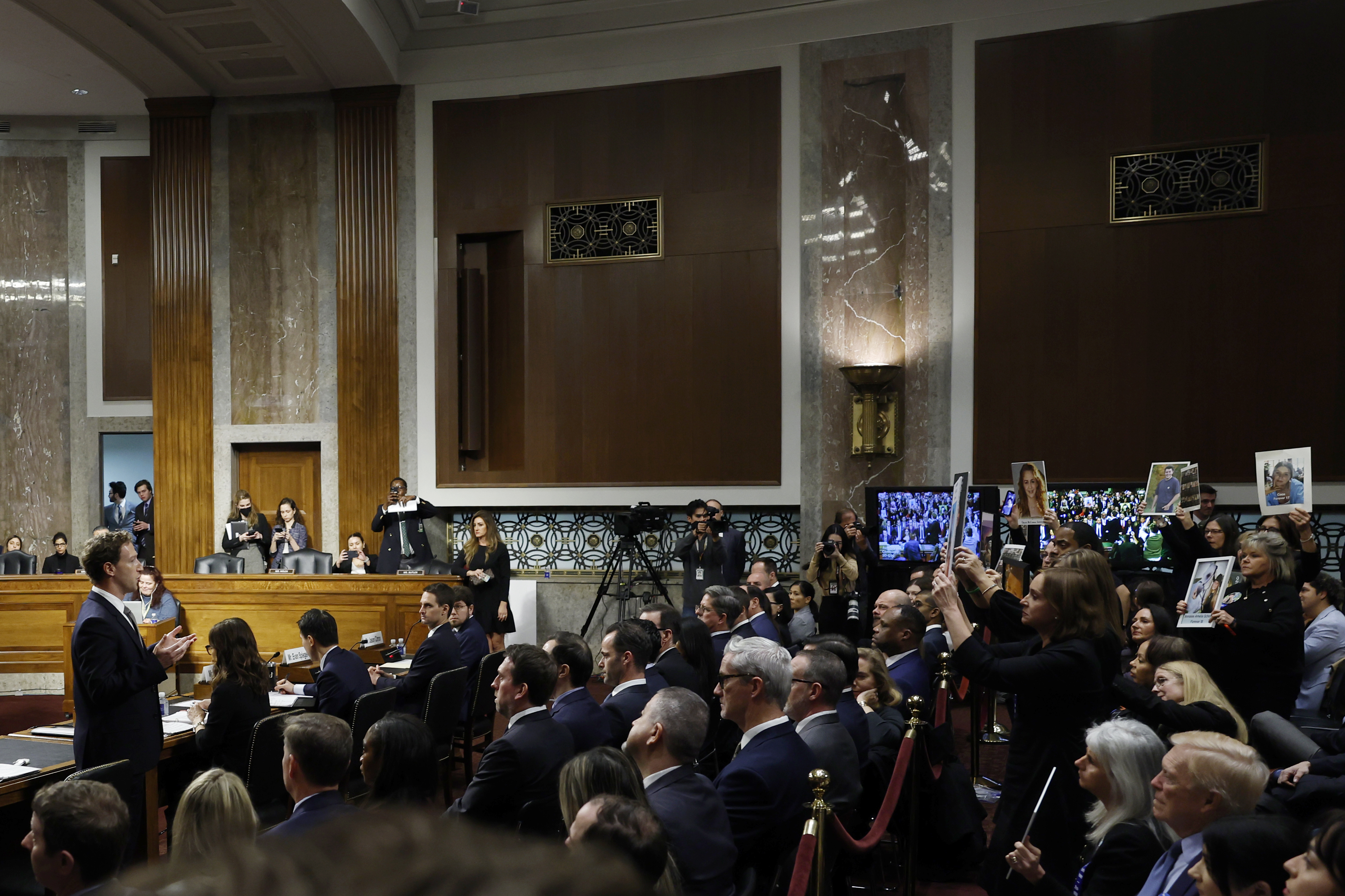 Mark Zuckerberg, CEO of Meta, speaks to family members of children who committed suicide—allegedly due in part to their experience on Instagram—during a Senate Judiciary Committee hearing at the Dirksen Senate Office Building on January 31, 2024, in Washington, D.C. (Photo by Anna Moneymaker/Getty Images)