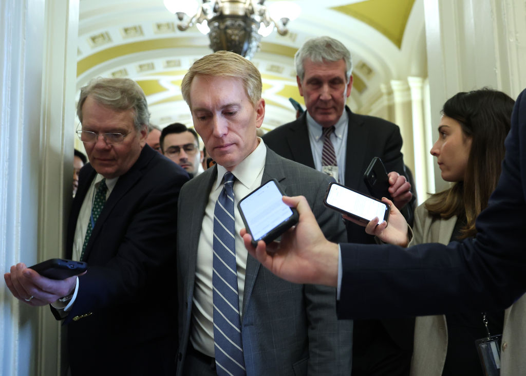 GOP Sen. James Lankford of Oklahoma talks to reporters as he makes his way to a meeting at the U.S. Capitol in Washington, D.C. on February 5, 2024.  (Photo by Kevin Dietsch/Getty Images)