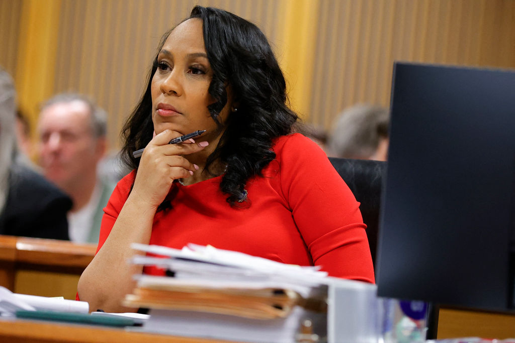 Fulton County District Attorney Fani Willis listens during the final arguments in her disqualification hearing at the Fulton County Courthouse on March 1, 2024, in Atlanta, Georgia. (Photo by ALEX SLITZ/POOL/AFP via Getty Images)