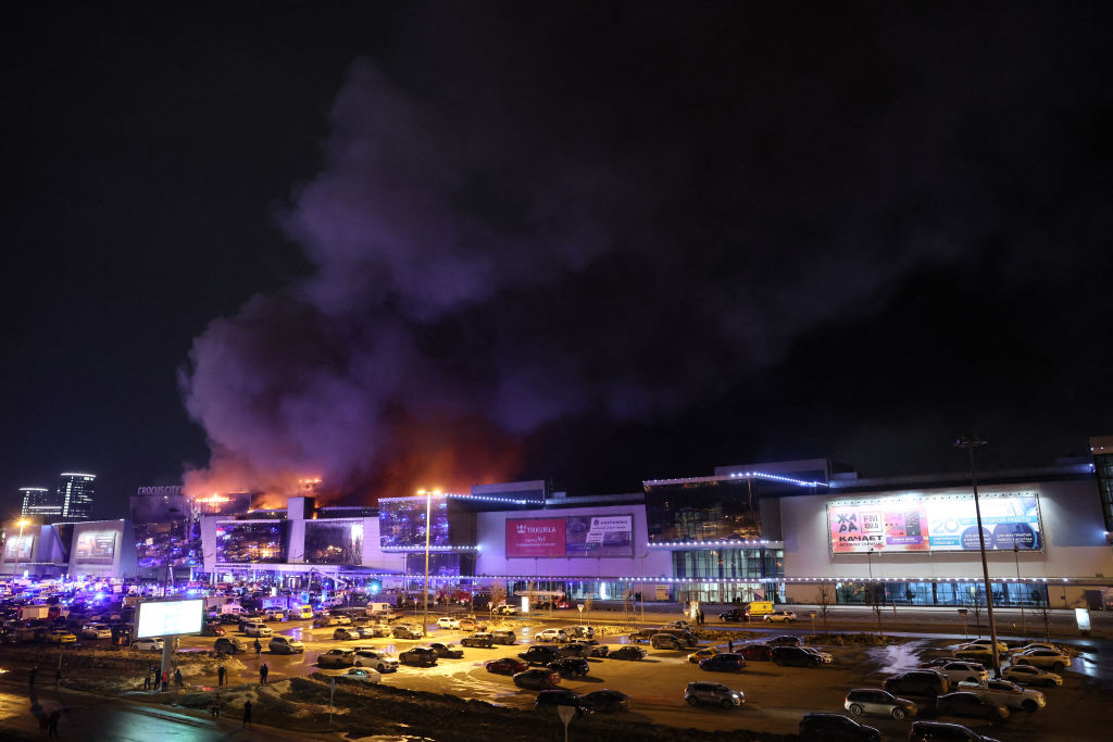 The burning Crocus City Hall concert hall following the terrorist attack in Krasnogorsk, outside Moscow, on March 22, 2024. (Photo by STRINGER/AFP via Getty Images)