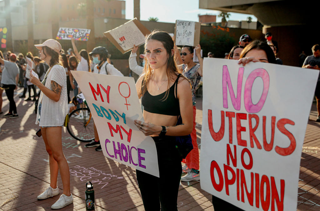 Protesters chant during a pro-choice rally in Tucson, Arizona, on Monday, July 4, 2022. (Photo by SANDY HUFFAKER/AFP via Getty Images)