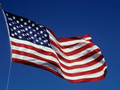 The American Flag waving in the wind.