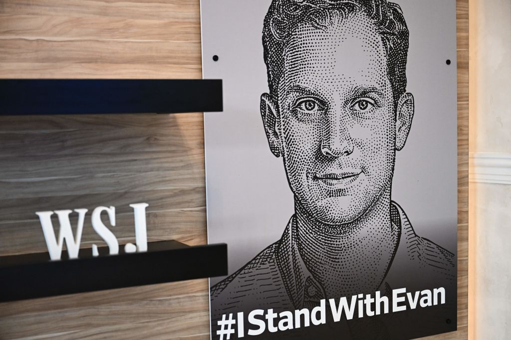An illustration of Wall Street Journal reporter Evan Gershkovich, who was arrested on espionage charges in Russia, is displayed during the WSJ Tech Live conference in Laguna Beach, California, on October 16, 2023. (Photo by PATRICK T. FALLON/AFP via Getty Images)
