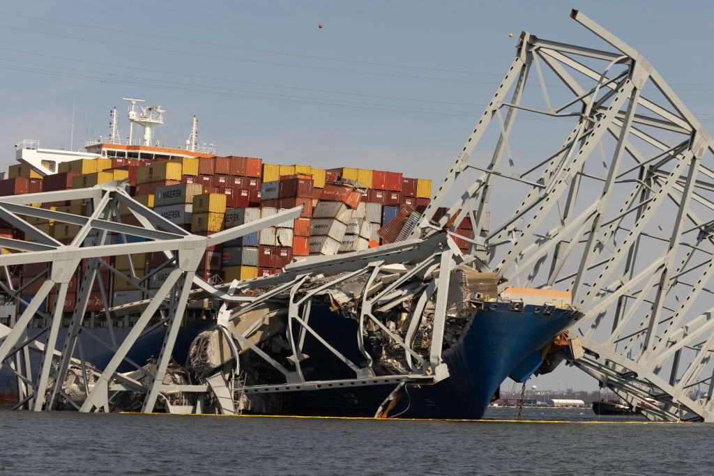 Wreckage from the collapsed Francis Scott Key Bridge rests on the Dali cargo ship on March 30, 2024, as efforts begin to clear the debris and reopen the Port of Baltimore. (Photo by Scott Olson/Getty Images)