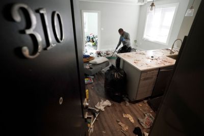 WASHINGTON, DC – JANUARY 27: Victor Garcia cleans a vacated uni