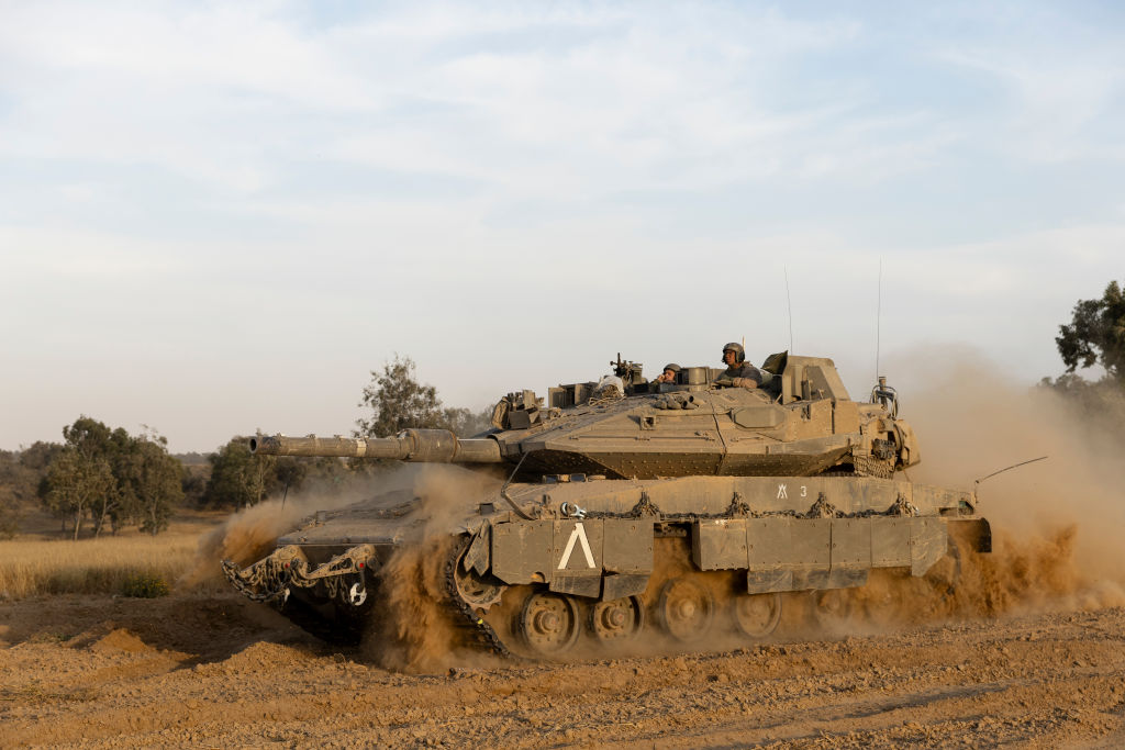 An Israeli tank moves near the border with the Gaza Strip on May 2, 2024. (Photo by Amir Levy/Getty Images)