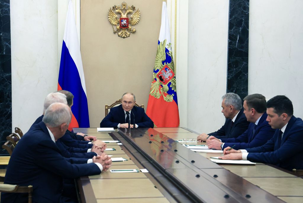 In this pool photograph distributed by Russia's state-run news agency Sputnik, Russian President Vladimir Putin chairs a meeting on the development of the country's military-industrial complex at the Kremlin in Moscow on May 15, 2024. (Photo by VYACHESLAV PROKOFYEV/POOL/AFP via Getty Images)