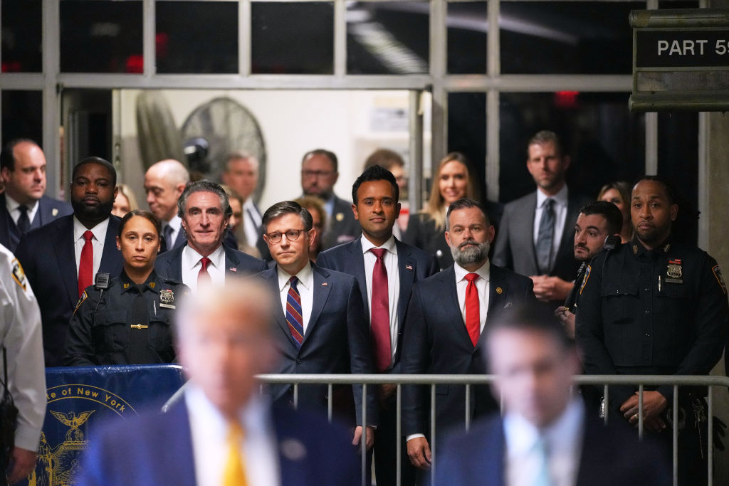House Speaker Mike Johnson and former presidential candidate Vivek Ramaswamy listen as former President Donald Trump speaks to the media outside the Manhattan Criminal Court in New York City on May 14, 2024. (Photo by Curtis Means - Pool/Getty Images)