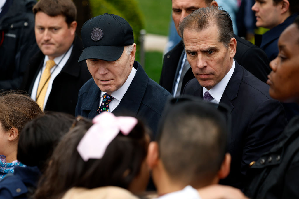 President Joe Biden and his son Hunter talk with guests during the White House Easter Egg Roll on 1, 2024, in Washington, D.C. (Photo by Chip Somodevilla/Getty Images)