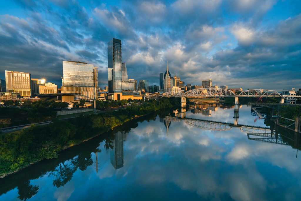 Sunset to night view of Nashville Skyline as seen over the Cumberland River