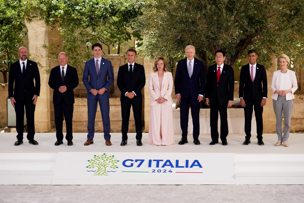 European Council President Charles Michel, German Chancellor Olaf Scholz, Canadian Prime Minister Justin Trudeau, French President Emmanuel Macron, Italian Prime Minister Giorgia Meloni, U.S. President Joe Biden, Japanese Prime Minister Fumio Kishida, British Prime Minister Rishi Sunak, and European Commission President Ursula von der Leyen pose for a photo during a welcome ceremony on the first day of the 50th G7 summit at Borgo Egnazia in Fasano, Italy, on June 13, 2024. (Photo by Christopher Furlong/Getty Images)