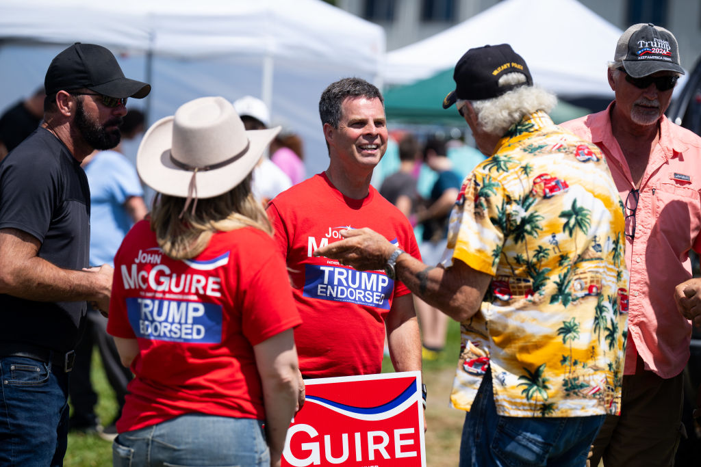 John McGuire, a Republican candidate in Virginia's 5th Congressional District, speaks with supporters at the Annual Father's Day Car Show in Bumpass, Virginia, on Saturday, June 15, 2024. (Bill Clark/CQ-Roll Call, Inc via Getty Images)